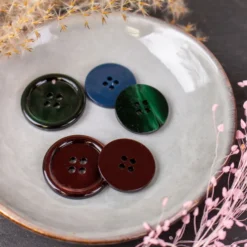 Bouton galalithe uni - vert