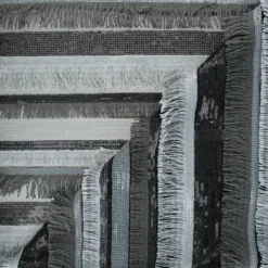 Coupon 100 cm x 140 cm Tissu Paillettes sur tulle Franges Charleston - noir