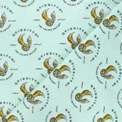 Tissu coton Harry Potter Quidditch et vif d'or - vert d'eau