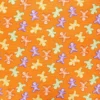 Tissu coton phosphorescent Glow ghosts - Skeleton bones - orange
