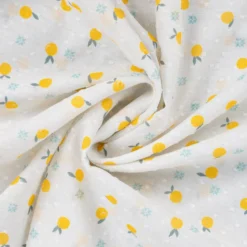 Tissu voile de coton plumetis Citrons - écru